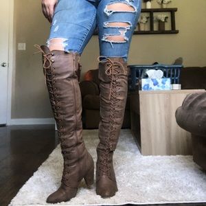 Brown knee high lace up boots